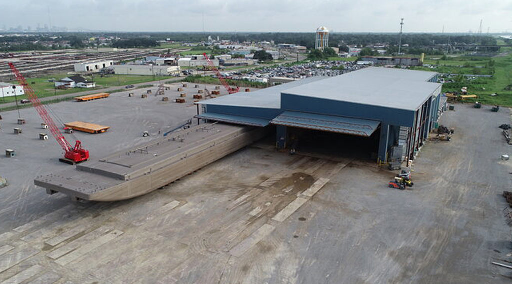 Exterior Marine Hydraulic Hangar Door System for C&C Marine Paint and Blast Building