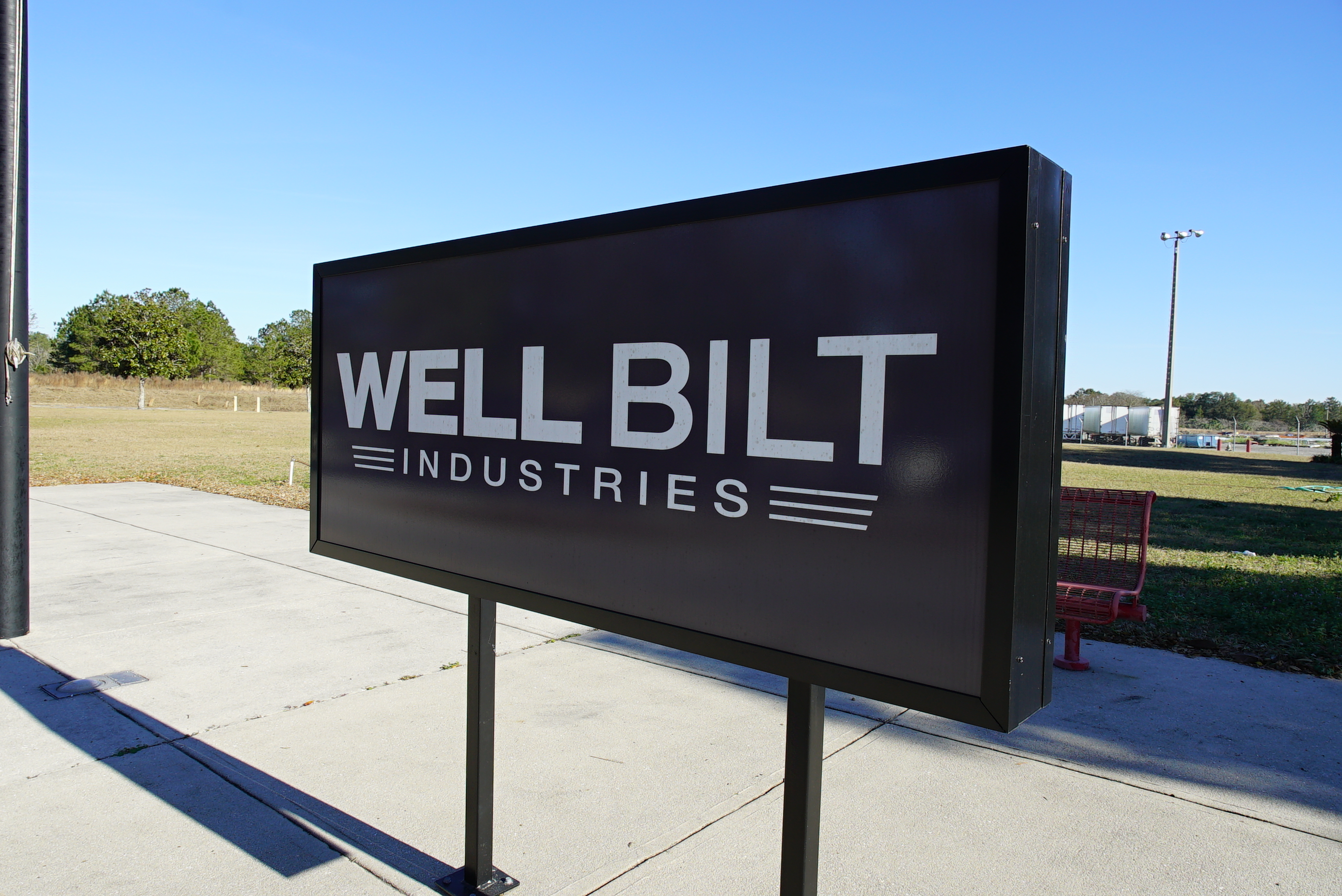WELL BILT Industries Sign