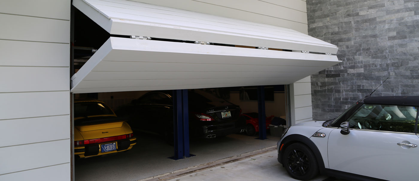 Residential Bi-Fold Garage Hangar Door by WELL BILT Industries