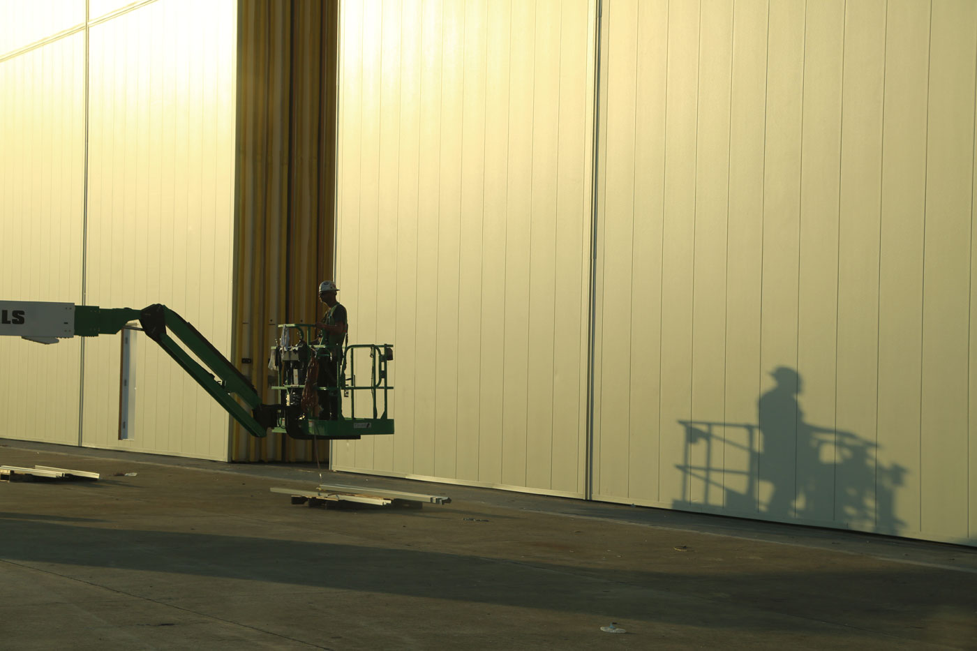 Multiple Panels of Bottom Rolling Hangar Door System